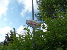 A sign with the name of the allotments in Änggårdskolonin, Göteborg, Sweden